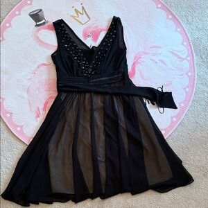 Chic Black Backless Dress with Beaded Detail